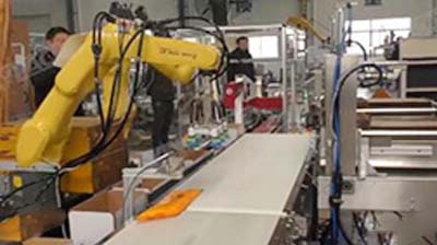 袋装油机器人装箱码垛包装线